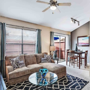 Open concept living and dining space with high ceilings at Galleria