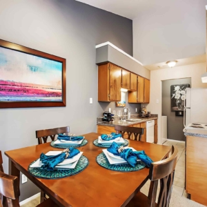 Dining and Kitchen area with white appliances